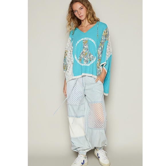 75. NWOT POL Turquoise Oversized V-neck Floral Peace Sign Hoodie - Picture 4 of 7
